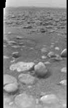 Black and white images of rocks on the surface of Titan